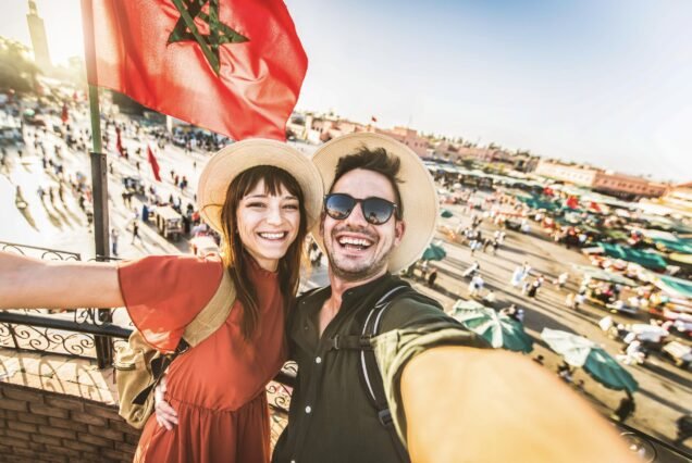 happy-tourists-couple-visiting-jamaa-
